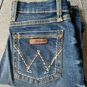 76% Cotton/23% Polyester/1% Spandex; 11 Oz. Stretch Denim